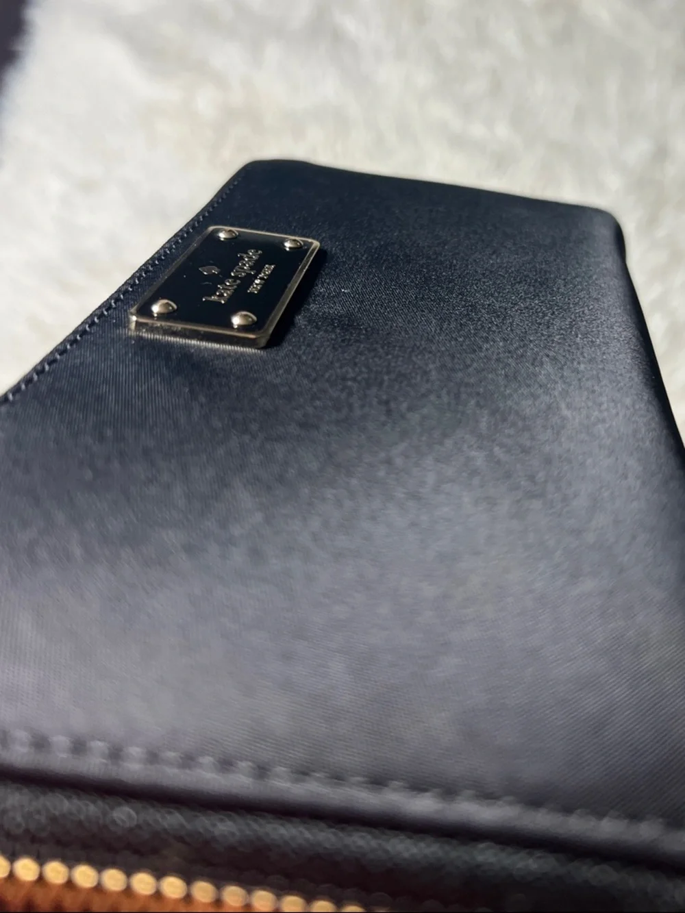 kate spade Black Zip-Around Logo Plate Wallet